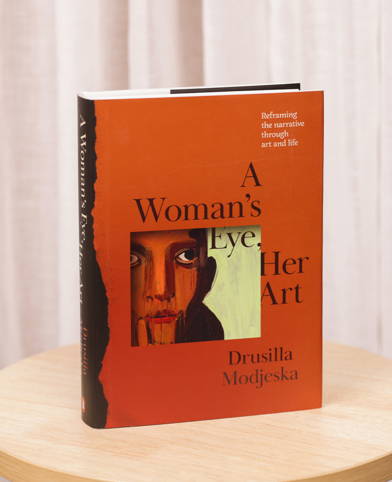 A Woman's Eye, Her Art book on table
